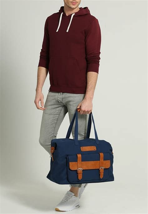 sac de voyage homme michael kors|Sacs de voyage et de fin de semaine pour hommes .